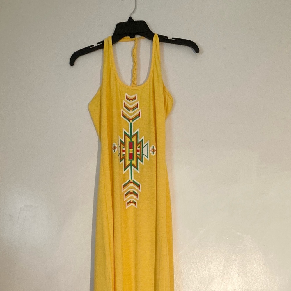 COPY - Long yellow dress with t back design. Cute print in front.